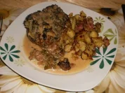 Geschmorte Rahm-Koteletts zu Bratkartoffeln - Rezept