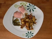 Bratkartoffeln an gerolltem Schinkenröllchen mit Rettichcreme gefüllt - Rezept