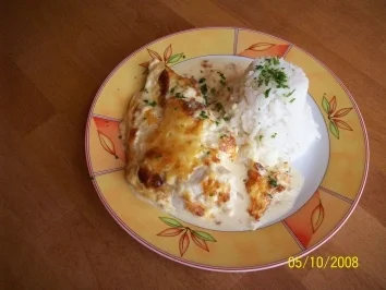 Hähnchenbrustfilet mit Zwiebelhaube - Rezept