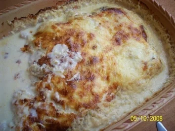 Hähnchenbrustfilet mit Zwiebelhaube - Rezept