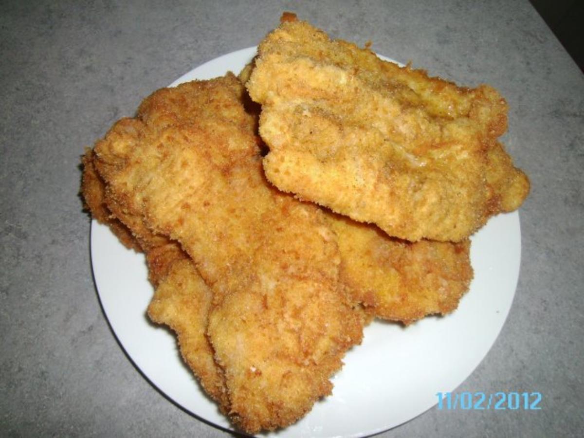 Panierte Schweineschnitzel - ganz traditionell - Rezept