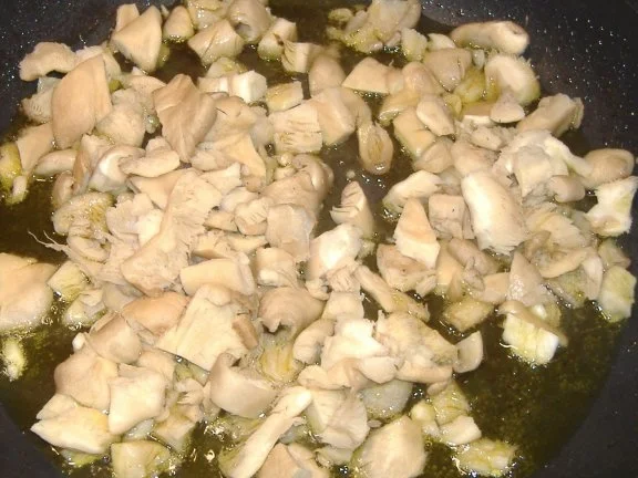 Koteletts mit Tomatenkompott und Pilzbechamel überbacken - Rezept - Bild Nr. 4