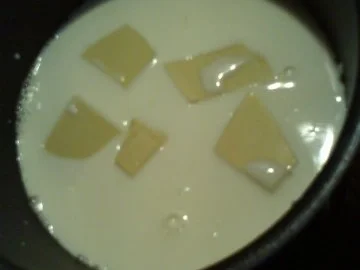 Rezept: Schokoravioli mit Frischkäse-Honig-Nussfüllung in weißer Schokosoße Bild Nr. 13 Schokoravioli mit Frischkäse-Honig-Nussfüllung in weißer Schokosoße - Rezept - Bild Nr. 13