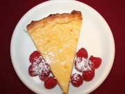 Zitronen-Limetten-Kuchen mit frischen Beeren - Rezept