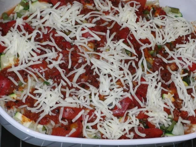 Rezept: Fisch : Resteauflauf mit Fischfilet eingebettet in Reis und Gemüse Bild Nr. 7 Fisch : Resteauflauf mit Fischfilet eingebettet in Reis und Gemüse - Rezept - Bild Nr. 7