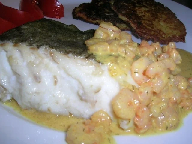 Skrei mit Krabbenragout an Rösti - Rezept