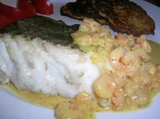 Skrei mit Krabbenragout an Rösti - Rezept