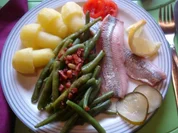 Matjesfilet mit Speckbohnen und Kartoffelpilzen - Rezept