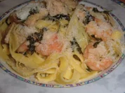 Tagliatelle mit Rucola, Lachs und Scampis - Rezept