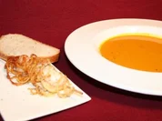 Kürbissuppe und mit Kartoffelspagetti ummantelte Scampi - Rezept