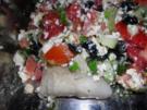 Steinbeisser mit Schafskäse überbacken - Rezept