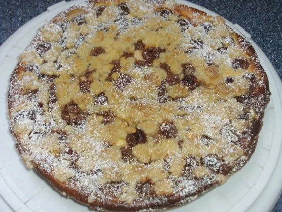 Quarkkuchen mit Stachelbeeren und Streuseln - Rezept