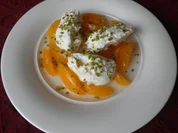 Quarknocken auf beschwipsten Aprikosen - Rezept