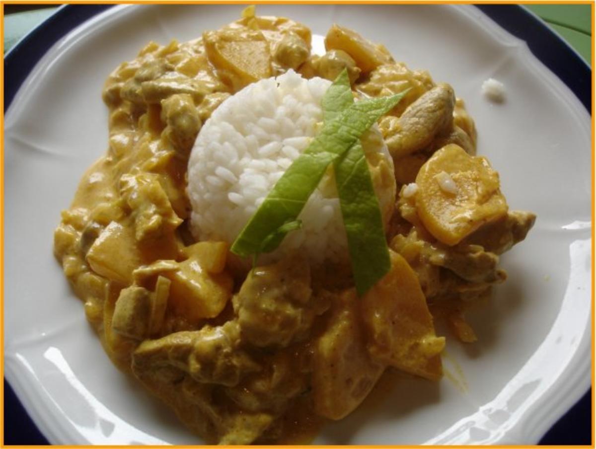 Schweinefilet in Currysauce mit Reis und Blattsalat - Rezept