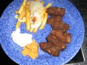 Cevapcici mit Pommes Tzaziki und Knoblauchbutter - Rezept