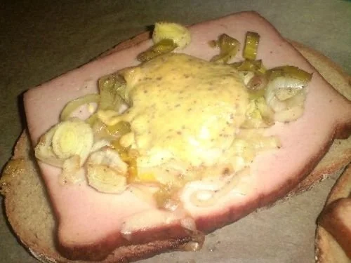 Überbackene Fleischkäseschnitten - Rezept