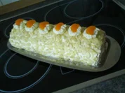 Mandarinen-Mandelbiskuitrolle mit Mangocremefüllung - Rezept