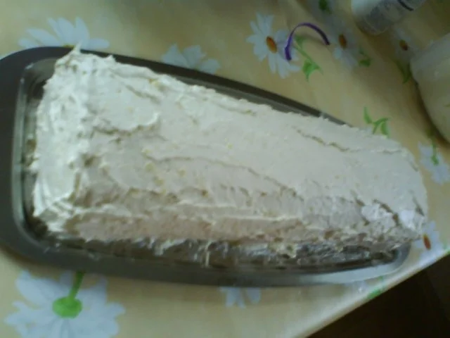 Mandarinen-Mandelbiskuitrolle mit Mangocremefüllung - Rezept - Bild Nr. 6