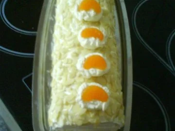 Mandarinen-Mandelbiskuitrolle mit Mangocremefüllung - Rezept - Bild Nr. 7