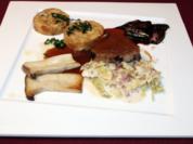 Brasato al Barolo mit Grappaknödel, Kräuterseitlingen und Rahm-Speck-Wirsing - Rezept