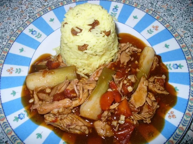 Putenbrust mit Reis und Rosinen - Rezept