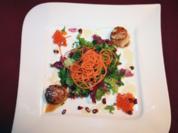 Gebratene Jakobsmuscheln auf Rucola mit Granatapfeldressing - Rezept