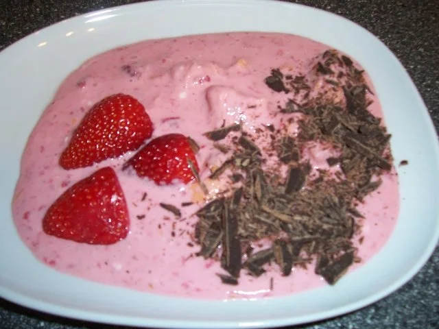 Erdbeeren und Orangen in Frischkäse getaucht... - Rezept