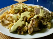 Geflügel: Putenoberkeule mit Kokos-Green-Curry-Soße und Chili-Tomatenbandnudeln - Rezept