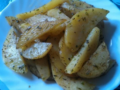 Rezept: Gebackene Kartoffelspalten. Gebackene Kartoffelspalten. - Rezept