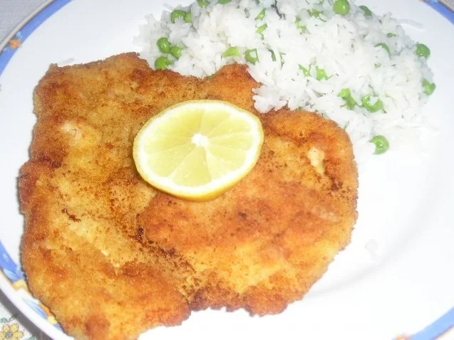 Gebackene Hühnerschnitzel mit Risipisi - Rezept
