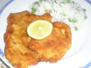 Gebackene Hühnerschnitzel mit Risipisi - Rezept