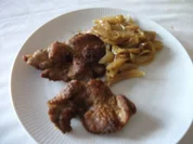 Kotelett mit Curry-Zwiebeln - Rezept