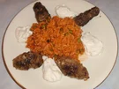 Rezept: Cevapcici mit Tomaten-Erbsen-Reis Cevapcici mit Tomaten-Erbsen-Reis - Rezept