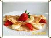 Crêpes mit Erdbeeren und Banane - Rezept