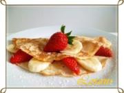 Crêpes mit Erdbeeren und Banane - Rezept