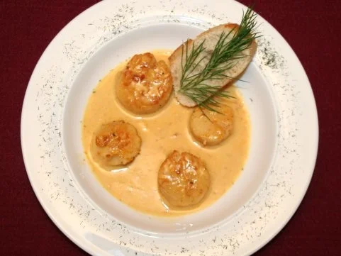 Rezept: Jakobsmuscheln in Orangensoße Jakobsmuscheln in Orangensoße - Rezept