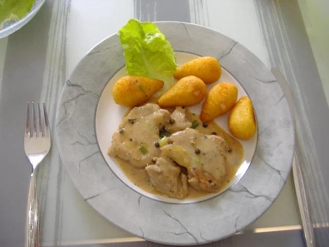 Rezept: Schweinefilet mit Cognac-Pfeffersoße Schweinefilet mit Cognac-Pfeffersoße - Rezept