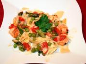 Rezept: Tagliatelle mit Spargel und Garnelen, dazu schaumige Zitronensoße Tagliatelle mit Spargel und Garnelen, dazu schaumige Zitronensoße - Rezept
