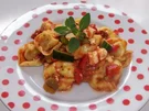 Rezept: Tortellinisalat mit Tomatendressing und Kräutern Tortellinisalat mit Tomatendressing und Kräutern - Rezept
