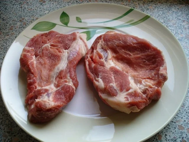 Schnitzel vom Schweinekamm mit Schwenkkartoffeln - Rezept - Bild Nr. 2