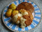 Schnitzel vom Schweinekamm mit Schwenkkartoffeln - Rezept