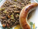 Linsen mit Schweinsbratwurst - Lenticchie con salsiccia di maiale - Rezept