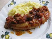 Weinbratwürste auf Pilzen - Rezept