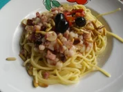 Spaghetti mit getrockneten Tomaten, Speck und Zitrone - Rezept