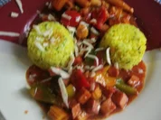 Leberkäsepfanne mit Paprika und Reis - Rezept