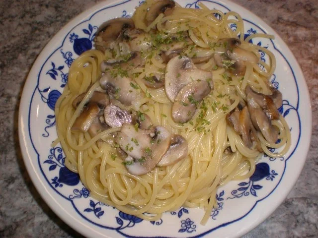 Spaghetti mit Champignonsauce - Rezept