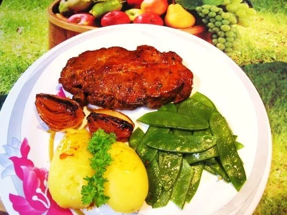 Nackensteaks mit Zuckerschoten - Rezept