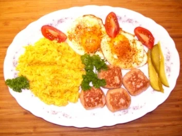 Leberkäse mit Curryreis und Spiegelei - Rezept