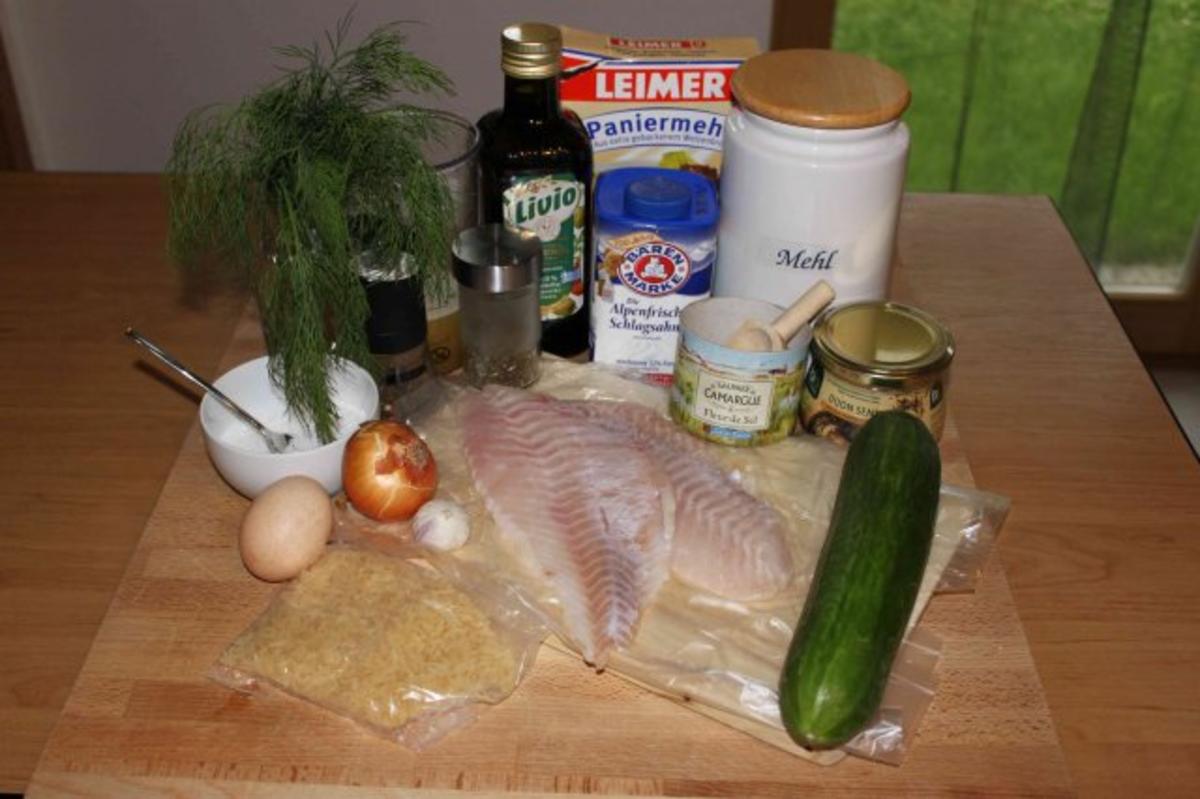 Rotbarschfilet paniert mit Schmorgurken und Reis - Rezept - kochbar.de