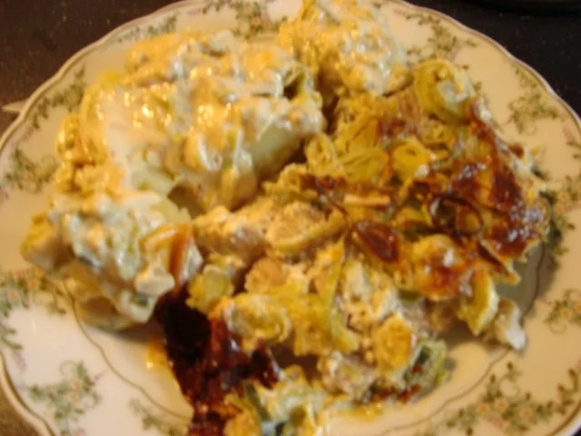 Rezept: Seelachsfilet unter Porree-Käsesauce-Haube Seelachsfilet unter Porree-Käsesauce-Haube - Rezept